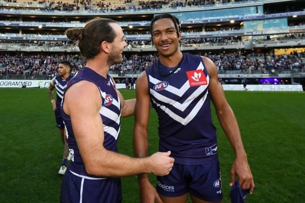 Debutant Brandon Walker of the Dockers happy with his team's win during the 2021 AFL Round 13 match between the Fremantle Dockers and the Gold Coast...