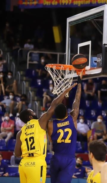 Cory Higgins of FC Barcelona and Charles Jenkins of Lenovo Tenerife battle for the ball during the Liga ACB match between FC Barcelona and Tenerife...