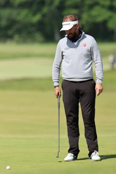 Joost Luiten of the Netherlands watches his ball on the 9th hole during the third round of The Scandinavian Mixed Hosted by Henrik and Annika at...