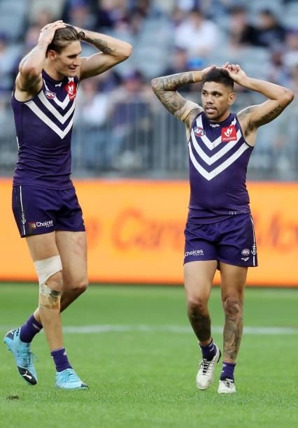 Rory Lobb and Michael Walters of the Dockers during the 2021 AFL Round 13 match between the Fremantle Dockers and the Gold Coast Suns at Optus...
