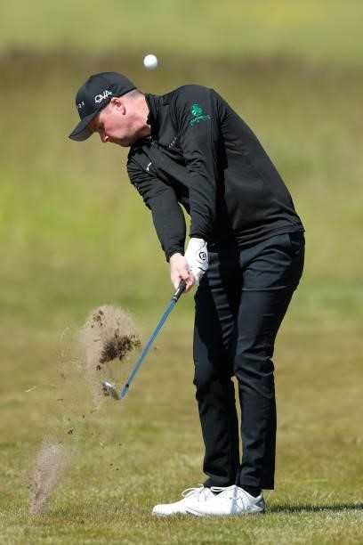 Jonathan Caldwell of Northern Ireland hits his second shot on the 18th hole during the third round of The Scandinavian Mixed Hosted by Henrik and...