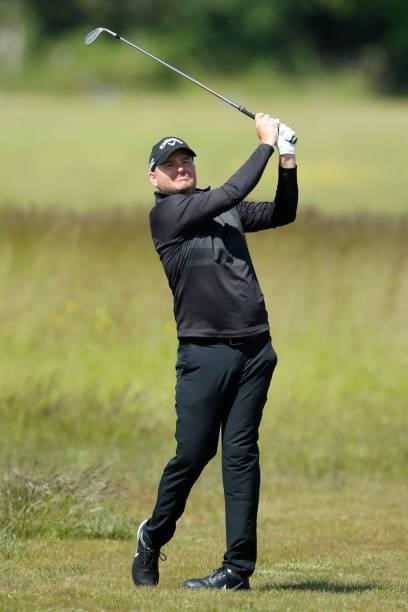 James Morrison of England hits his second shot on the 18th hole during the third round of The Scandinavian Mixed Hosted by Henrik and Annika at...