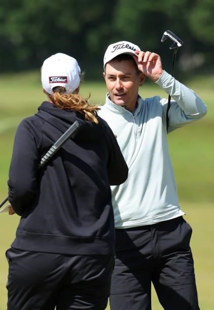 Jason Scrivener of Australia reacts to Leonie Harm of Germany on the 9th hole during the third round of The Scandinavian Mixed Hosted by Henrik and...