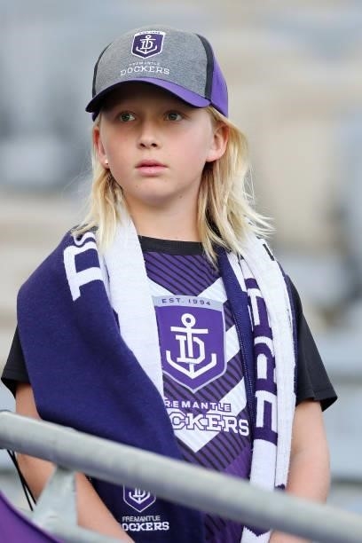 Dockers fan looks on during the 2021 AFL Round 13 match between the Fremantle Dockers and the Gold Coast Suns at Optus Stadium on June 12, 2021 in...