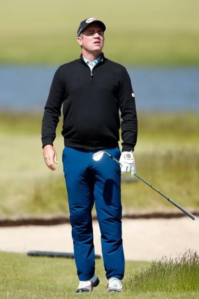 Scott Hend of Australia watches his second shot on the 18th hole during the third round of The Scandinavian Mixed Hosted by Henrik and Annika at...