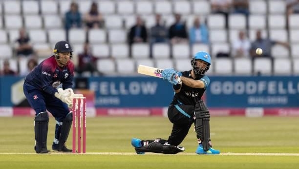 Moeen Ali of Worcestershire Rapids pulls as wicketkeeper Adam Rossington of Northamptonshire Steelbacks looks on during the Vitality T20 Blast match...