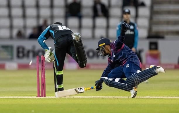 Saif Zaib of Northamptonshire Steelbacks is run out by wicketkeeper Ben Cox of Worcestershire Rapids during the Vitality T20 Blast match between...