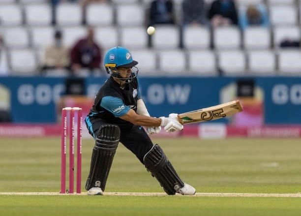 Brett D'Oliveira of Worcestershire Rapids ramps the ball over his shoulder during the Vitality T20 Blast match between Northamptonshire Steelbacks...