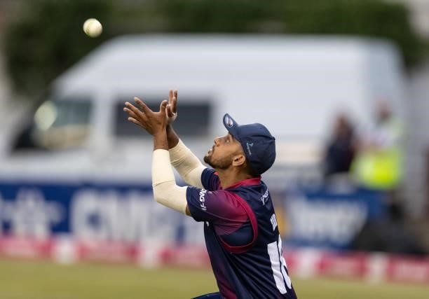 Saif Zaib of Northamptonshire Steelbacks takes a catch to dismiss Moeen Ali of Worcestershire Rapids during the Vitality T20 Blast match between...