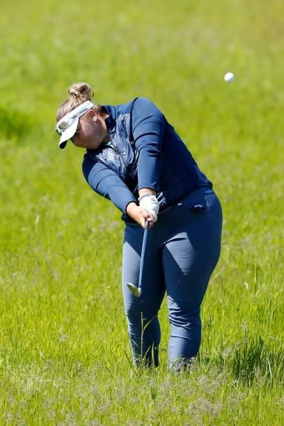 Alice Hewson of England hits her second shot on the 18th hole during the third round of The Scandinavian Mixed Hosted by Henrik and Annika at Vallda...