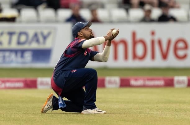 Saif Zaib of Northamptonshire Steelbacks takes a catch to dismiss Ben Cox of Worcestershire Rapids off of the last ball of the Worcestershire Rapids...