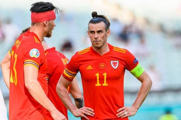 Gareth Bale of Wales talks to Kieffer Moore of Wales during the UEFA Euro 2020 Championship Group A match between Wales and Switzerland on June 12,...