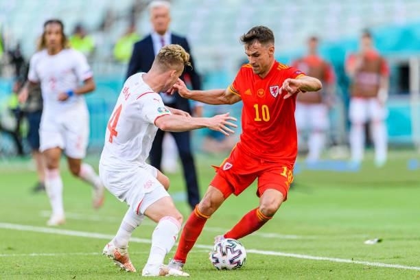 Aaron Ramsey of Wales in action against Nico Elvedi of Switzerland during the UEFA Euro 2020 Championship Group A match between Wales and Switzerland...