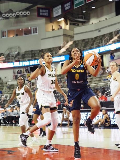 Kelsey Mitchell of the Indiana Fever drives to the basket against the Chicago Sky on June 12, 2021 at Bankers Life Fieldhouse in Indianapolis,...