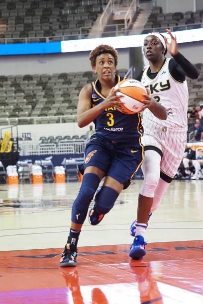 Danielle Robinson of the Indiana Fever drives to the basket against the Chicago Sky on June 12, 2021 at Bankers Life Fieldhouse in Indianapolis,...