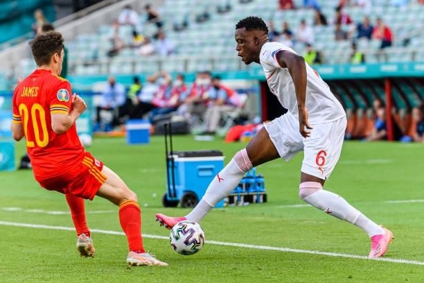 Denis Zakaria of Switzerland plays against Daniel James of Wales during the UEFA Euro 2020 Championship Group A match between Wales and Switzerland...