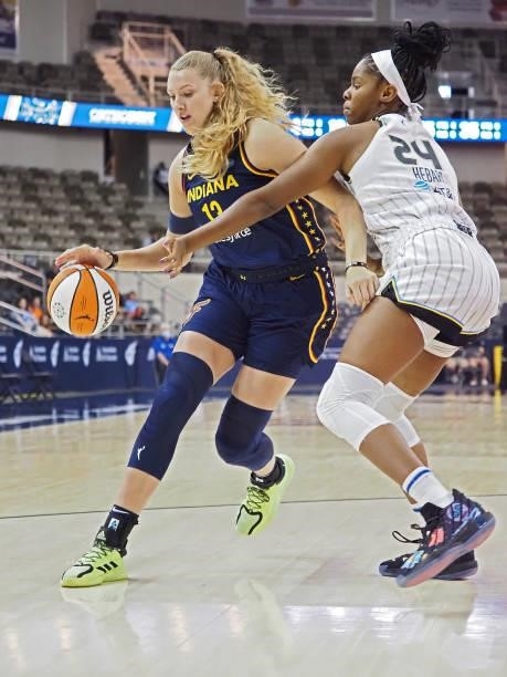 Lauren Cox of the Indiana Fever dribbles during the game against the Chicago Sky on June 12, 2021 at Bankers Life Fieldhouse in Indianapolis,...
