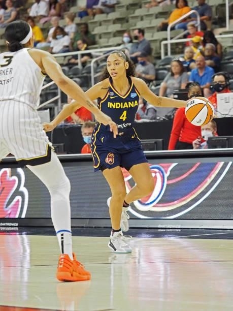 Kysre Gondrezick of the Indiana Fever dribbles during the game against the Chicago Sky on June 12, 2021 at Bankers Life Fieldhouse in Indianapolis,...