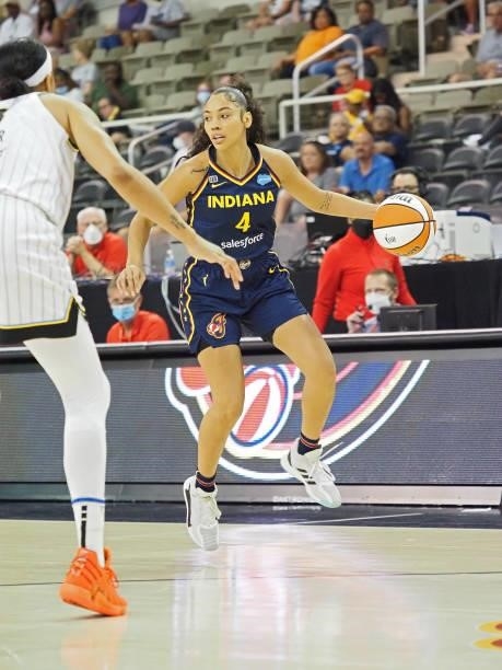 Kysre Gondrezick of the Indiana Fever dribbles during the game against the Chicago Sky on June 12, 2021 at Bankers Life Fieldhouse in Indianapolis,...