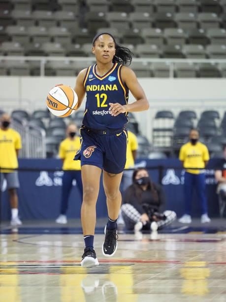 Lindsay Allen of the Indiana Fever dribbles during the game against the Chicago Sky on June 12, 2021 at Bankers Life Fieldhouse in Indianapolis,...