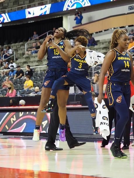 Teaira McCowan of the Indiana Fever celebrates with Danielle Robinson of the Indiana Fever during the game against the Chicago Sky on June 12, 2021...