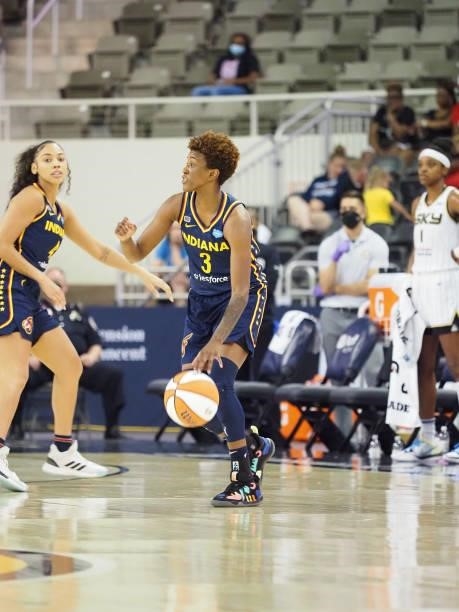 Danielle Robinson of the Indiana Fever dribbles during the game against the Chicago Sky on June 12, 2021 at Bankers Life Fieldhouse in Indianapolis,...