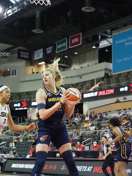 Lauren Cox of the Indiana Fever rebounds during the game against the Chicago Sky on June 12, 2021 at Bankers Life Fieldhouse in Indianapolis,...