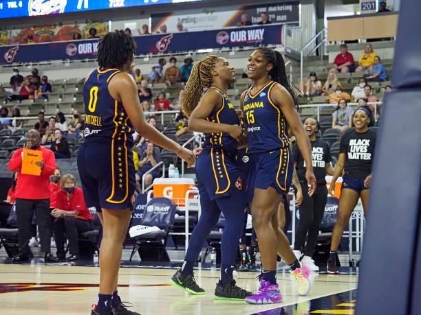 Jantel Lavender of the Indiana Fever high fives Teaira McCowan of the Indiana Fever during the game against the Chicago Sky on June 12, 2021 at...