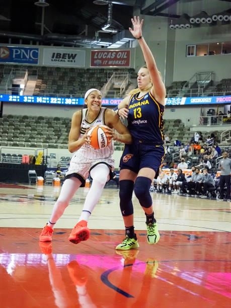 Candace Parker of the Chicago Sky drives to the basket against the Indiana Fever on June 12, 2021 at Bankers Life Fieldhouse in Indianapolis,...