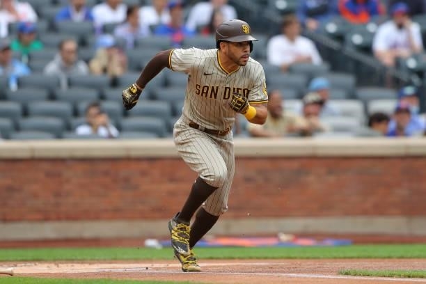 Tommy Pham of the San Diego Padres runs to first during the game between the San Diego Padres and the New York Mets at Citi Field on Saturday, June...