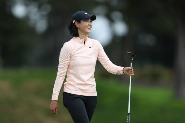 Michelle Wie West of the United States smiles after putting from the 1st hole during the round three of the LPGA Mediheal Championship at Lake Merced...