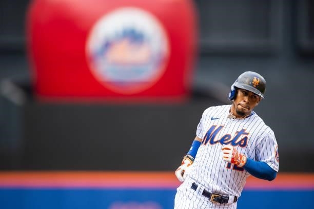 Francisco Lindor of the New York Mets jogs around the bases after hitting a 2-ruin home run in the first inning at Citi Field on June 12, 2021 in the...