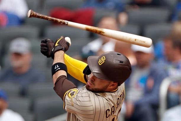 Victor Caratini of the San Diego Padres loses his bat during the third inning against the New York Mets at Citi Field on June 12, 2021 in the...
