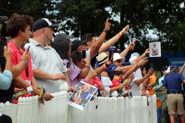 Fans ask for the autograph of boxer Canelo Alvarez of Mexico on the 18th hole during the third round of the BMW Charity Pro-Am presented by Synnex...