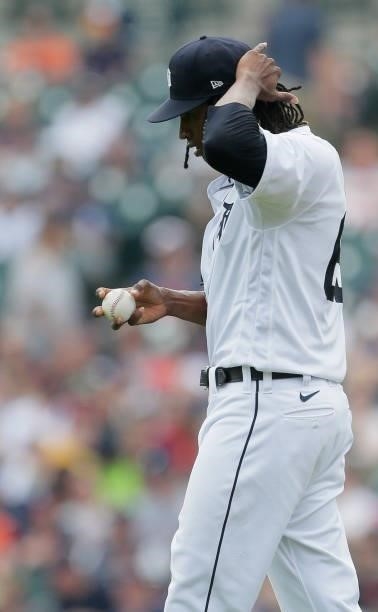 Jose Urena of the Detroit Tigers walks to the mound after giving up a three-run home run to Brian Goodwin of the Chicago White Sox during the second...