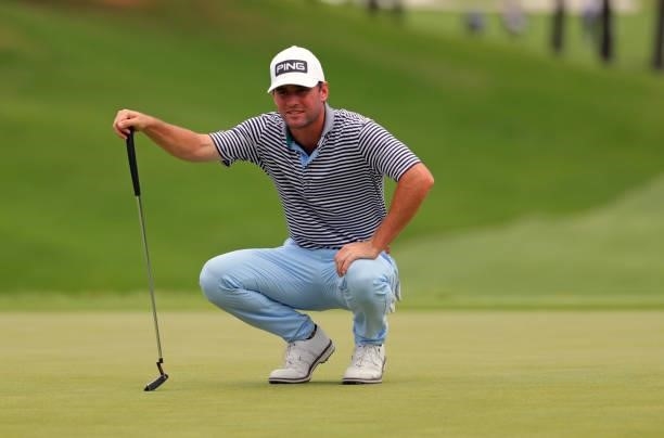 Austin Eckroat lines up his putt on the third hole during the third round of the BMW Charity Pro-Am presented by Synnex Corporation at the Thornblade...