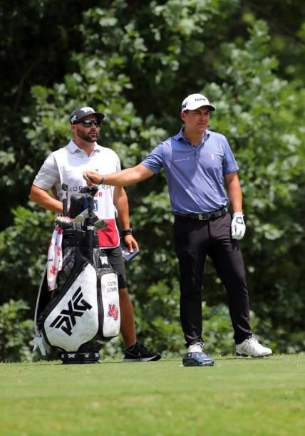 Justin Lower pulls a club from his bag on the fourth hole during the third round of the BMW Charity Pro-Am presented by Synnex Corporation at the...