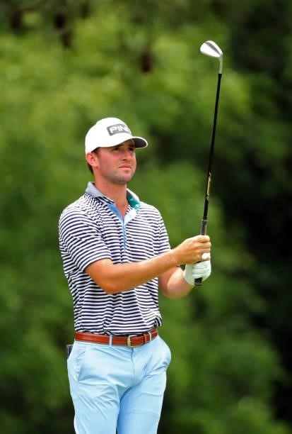 Austin Eckroat watches his tee shot on the fourth hole during the third round of the BMW Charity Pro-Am presented by Synnex Corporation at the...