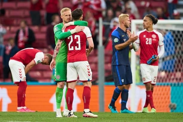 Goalkeeper Kasper Schmeichel of Denmark and Pierre-Emile Hojbjerg of Denmark showing emotions after the UEFA EURO 2020 Group B match between Denmark...