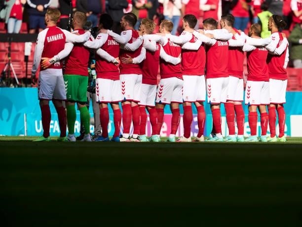 The players of Denmark during the national anthems prior to the UEFA EURO 2020 Group B match between Denmark and Finland at Parken Stadium on June...