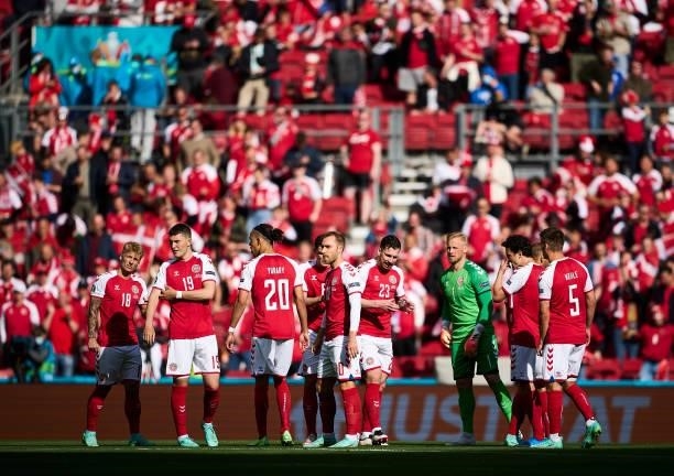 The players of Denmark huddle prior to the UEFA EURO 2020 Group B match between Denmark and Finland at Parken Stadium on June 12, 2021 in Copenhagen,...