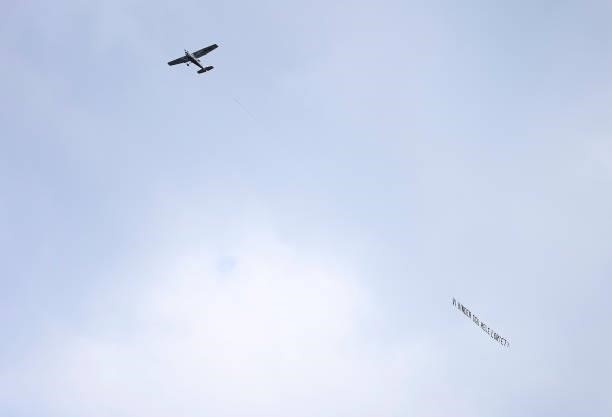 An aeroplane with a banner We are winning the hole ting supporting Denmark flying over stadium prior to the UEFA EURO 2020 Group B match between...