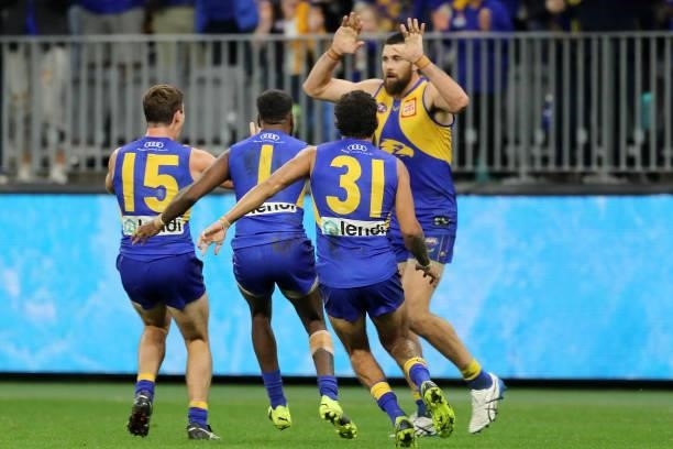 Josh J. Kennedy of the Eagles celebrates after scoring a last second goal during the 2021 AFL Round 13 match between the West Coast Eagles and the...