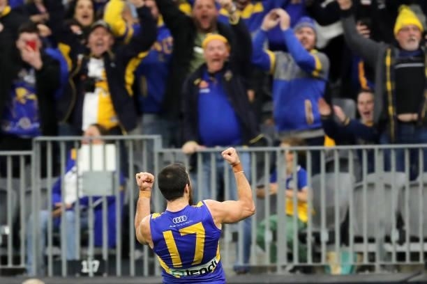 Josh J. Kennedy of the Eagles celebrates after scoring a last second goal during the 2021 AFL Round 13 match between the West Coast Eagles and the...