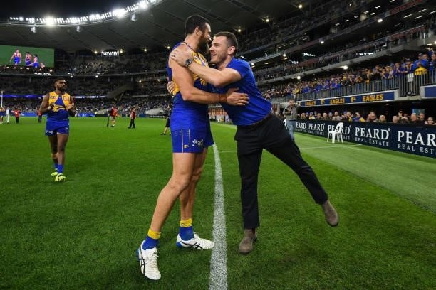 Josh J. Kennedy celebrates the win with Luke Shuey of the Eagles during the 2021 AFL Round 13 match between the West Coast Eagles and the Richmond...