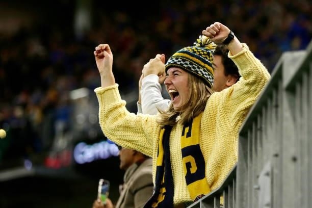 Eagles fans react after the teams win during the 2021 AFL Round 13 match between the West Coast Eagles and the Richmond Tigers at Optus Stadium on...