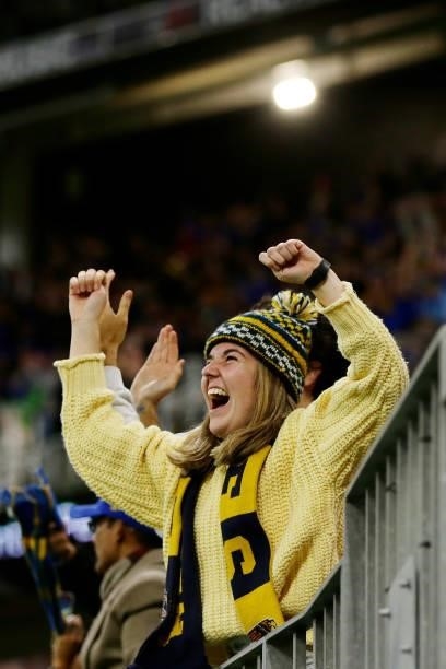 Eagles fans react after the teams win during the 2021 AFL Round 13 match between the West Coast Eagles and the Richmond Tigers at Optus Stadium on...