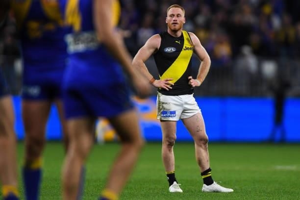 Nick Vlastuin of the Tigers looks dejected after a loss during the 2021 AFL Round 13 match between the West Coast Eagles and the Richmond Tigers at...