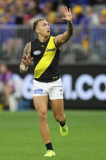 Shai Bolton of the Tigers reacts after missing a shot on goal during the 2021 AFL Round 13 match between the West Coast Eagles and the Richmond...