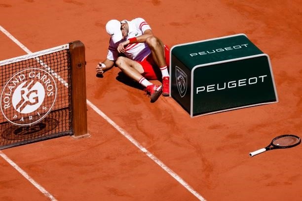 June 2021, France, Paris: Tennis: Grand Slam/ATP Tour - French Open, Singles, Men, Final, Djokovic - Tsitsipas . Novak Djokovic is down. Photo: Frank...